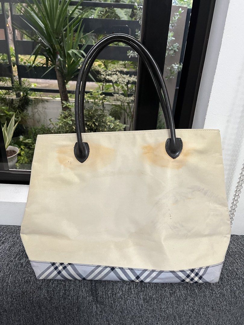 Burberry blue label project bag (Category: Luxury Bags & Wallets) located in Manila. Submitted by lersonbrie (Listing ID 1453906272, Image 2). Description: Nylon material, leather handles, clean inside, dirty outside, with zip Burberry blue label (japan) THIS IS A PROJECT BAG, have it painted , spa, embroider parts with stain. .