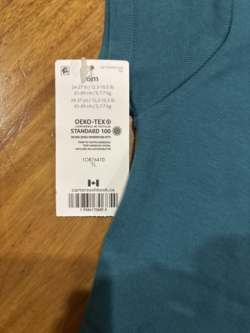 Carter's Baby Bodysuit 6M (Category: Babies & Kids Fashion) located in Pasig City. Submitted by logorini (Listing ID 1453973887, Image 3). Description: - Cute Carter's baby bodysuit - Short sleeves - Teal blue color - Features a dog graphic with "My best friend has Paws!" text - Made with OEKO-TEX certified fabric - Perfect for your little one.