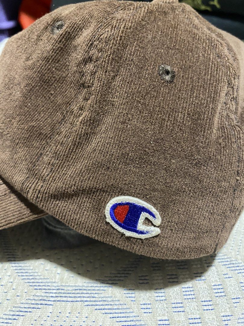 Champion Corduroy Cap Brown (Category: Caps & Hats) located in Manila. Submitted by cdb_22 (Listing ID 1453996030, Image 2). Description: - Champion brown corduroy cap - Embroidered Champion logo on front - Small logo patch on side - Adjustable strap for a custom fit - Made from a cotton and polyester blend - Ideal for everyday wear.