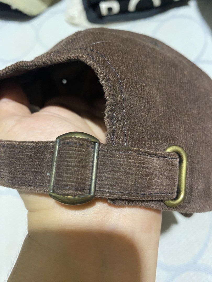 Champion Corduroy Cap Brown (Category: Caps & Hats) located in Manila. Submitted by cdb_22 (Listing ID 1453996030, Image 3). Description: - Champion brown corduroy cap - Embroidered Champion logo on front - Small logo patch on side - Adjustable strap for a custom fit - Made from a cotton and polyester blend - Ideal for everyday wear.