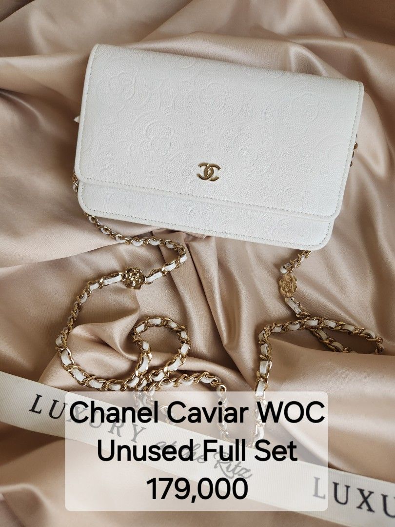 Chanel WOC (Category: Luxury Bags & Wallets) located in Makati City. Submitted by luxritz (Listing ID 1453910904, Image 1). Description: - Authentic Chanel Caviar WOC - Features embossed camellia pattern all over - Elegant gold hardware - Versatile leather and chain strap - Comes with full set (box, dustbag, authenticity card, etc.) - Brand new, unused condition.