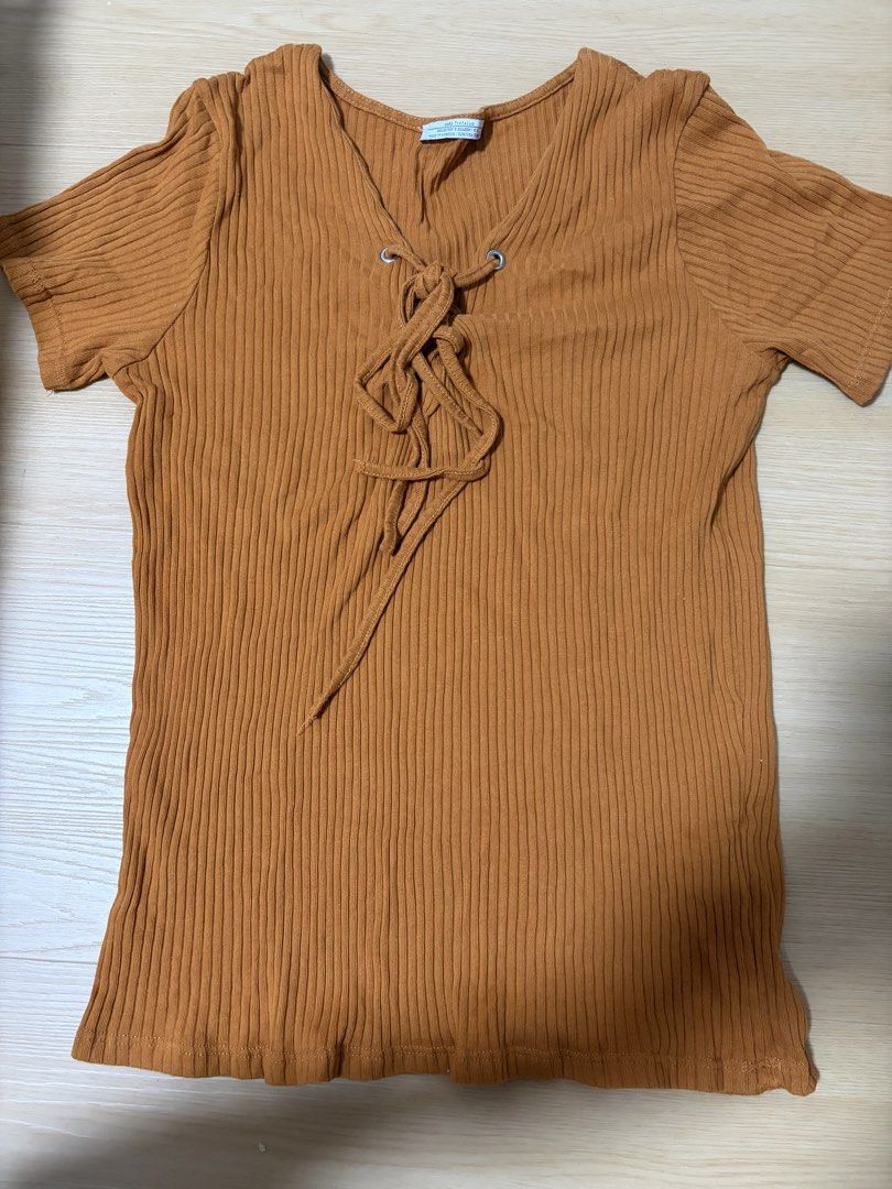 Clothes Bundle (Category: Shirts) located in Singapore. Submitted by mdnelyy (Listing ID 1453930772, Image 5). Description: fits Size S, adult ribbed shirts & cropped t-shirts. Include 2 kids ribbed tops size for - 156cm to 164cm. 13-14 yr old total 10 pcs for $6..