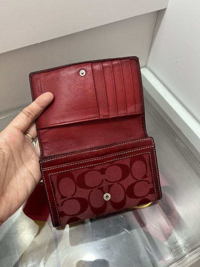Coach Signature Red Wallet (Category: Wallets & Card holders) located in Cabanatuan. Submitted by cristalcollection (Listing ID 1453855708, Image 2). Description: Signs of used only in good cond .