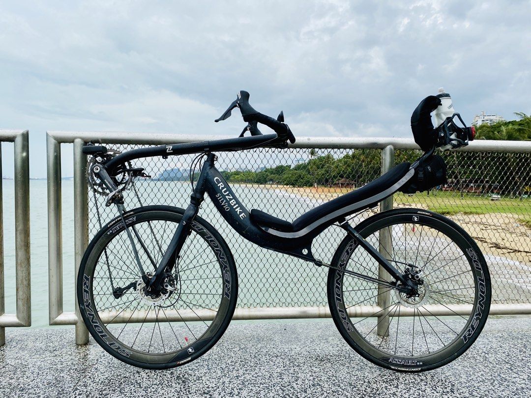 Cruzbike Silvio S30 - Recumbent Bike (Category: Bicycles) located in Singapore. Submitted by ivan.liew (Listing ID 1453896642, Image 1). Description: - Cruzbike Silvio S30, in between Cruzbike S40 and V20 with 30 degree seat angle. - Front wheel drive, moving bottom bracket recumbent. - Uses standard road bike groupset, 700c wheels. - Faster and more comfortable than any road or TT bike on the flats due to aerodynamics and ergonomics. - Safer cos