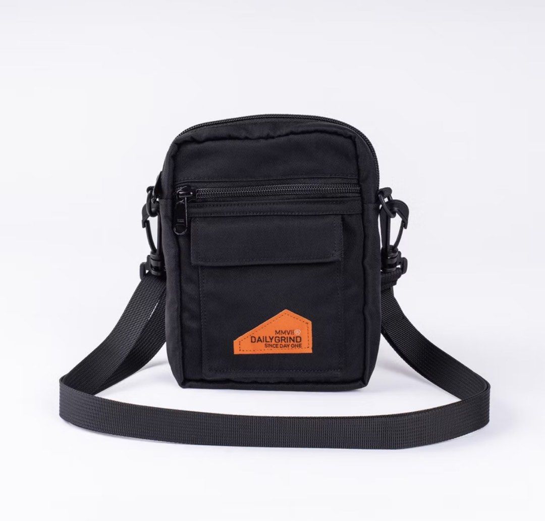 Daily Grind Black Crossbody Bag (Category: Sling Bags) located in Plaridel. Submitted by julien_stuff (Listing ID 1453981073, Image 1). Description: - Brand: Daily Grind - Color: Black - Style: Crossbody bag - Main compartment: Zippered - Front pockets: 1 velcro closure, 1 zippered - Zippers: YKK - Strap: Adjustable - Ideal for: Everyday use.