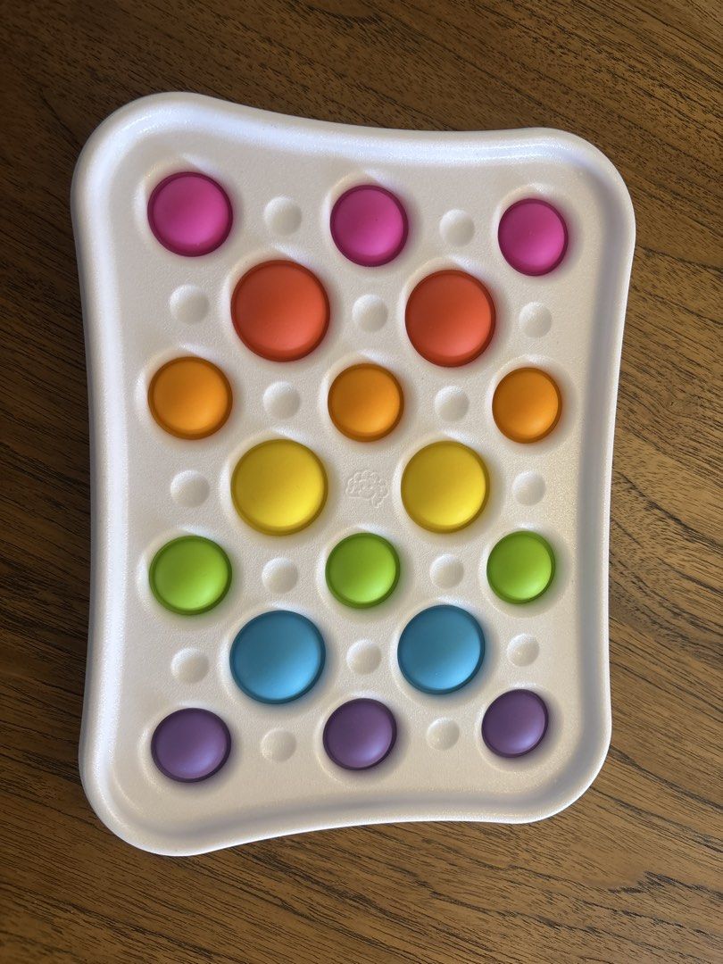 Dimpl Pops (Category: Kids Toys) located in Singapore. Submitted by sierratay (Listing ID 1453835984, Image 1). Description: From Fat Brain Toy Co Good for use when in the car, dining out etc BPA free .