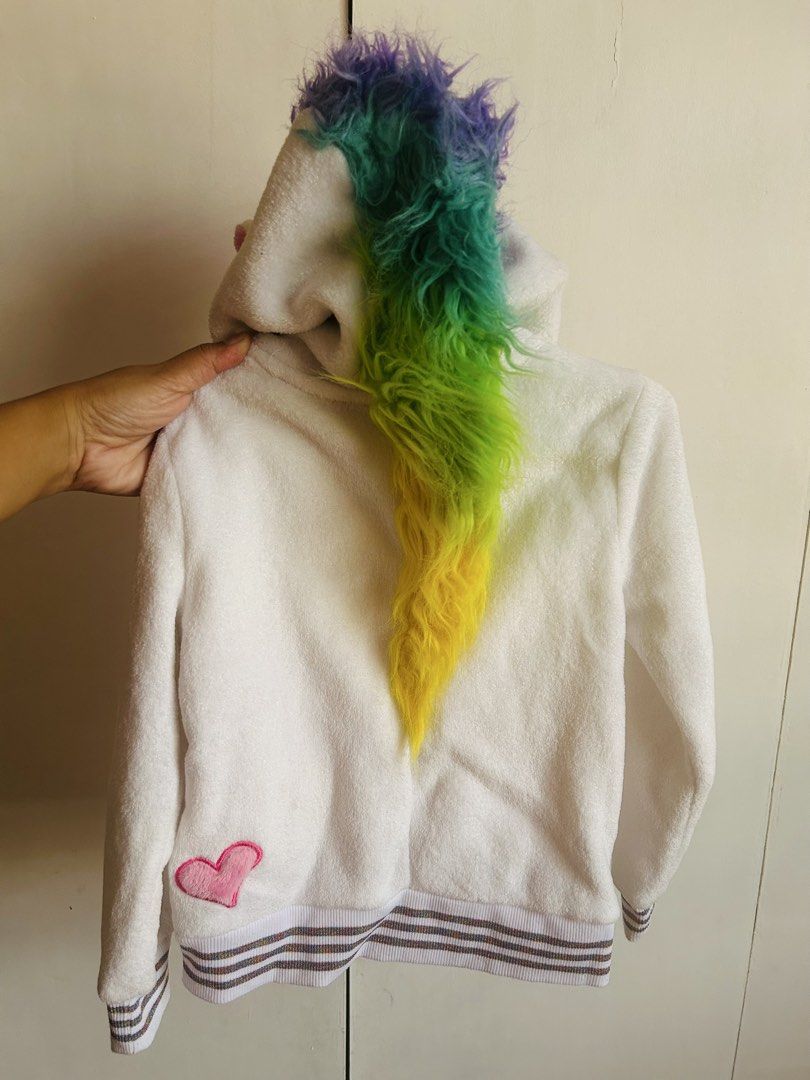 Disney Inside Out Unicorn Hoodie with Rainbow Zipper Pull (Category: Babies & Kids Fashion) located in Santa Rosa. Submitted by lovedbydane (Listing ID 1453814231, Image 2). Description: - Adorable white unicorn hoodie - Vibrant rainbow fluffy mane and tail - Hood features embroidered eyes and unicorn horn - Cute rainbow charm zipper pull - Comfortable ribbed cuffs and hem - Disney's Inside Out inspired design 4T on tag.