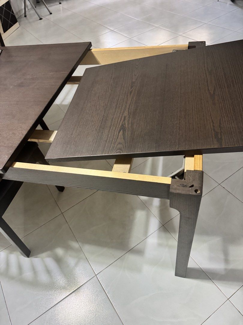 Extendable dining table (Category: Tables & Sets) located in Singapore. Submitted by ahazombroden (Listing ID 1453870135, Image 3). Description: Easily extendable dining table can sit up to 10 ppl when extended Length:180cm (extended 240cm) Breadth: 90cm Height: 75cm Self collect and self arrange delivery Can nego.