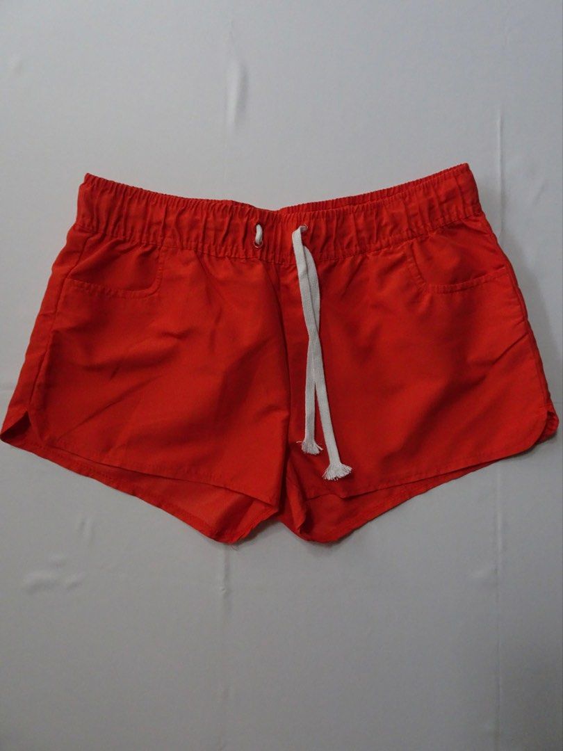 FashionSpark Orange Drawstring Low-Waist Shorts Size M (Category: Shorts) located in Manila. Submitted by kim.declutterss (Listing ID 1453948902, Image 1). Description: - Size: Medium (fits small-medium) - Color: Orange - Garterized waistband with white drawstring - With side pockets - Style: Casual, Loungewear - Fit: Comfortable - Color may vary due to lighting.