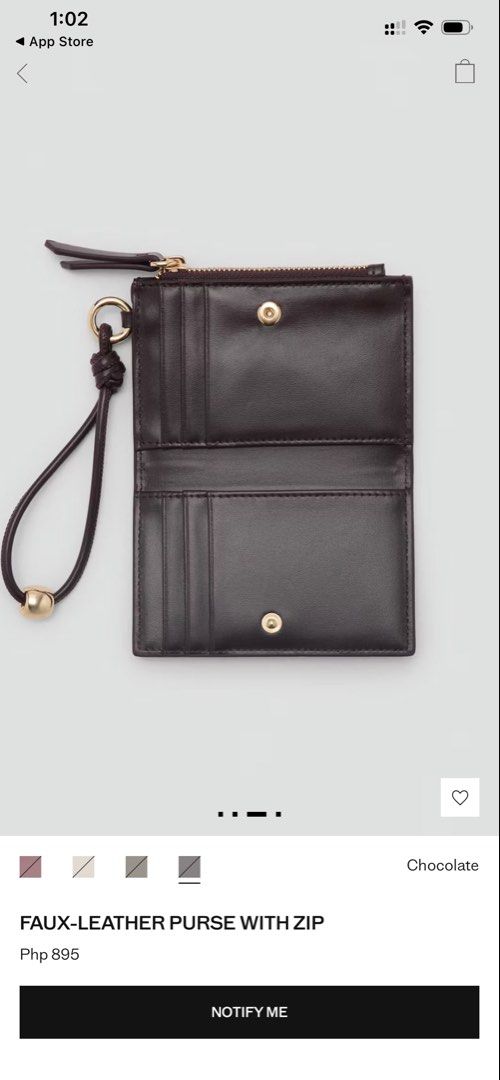 Faux-Leather Purse With Zip (Category: Purses & Pouches) located in Tagum. Submitted by declutrandom (Listing ID 1453855093, Image 3). Description: •Well used with visible scratches and dents • Interior lining has a small tear (see photos) • Zipper works properly • Still functional for coins, cash, or small essentials • Sold as-is. Please review all photos before purchasing..