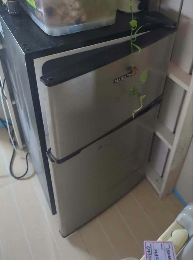 Fujidenzo Mini Fridge (Category: Refrigerators and Freezers) located in Makati City. Submitted by jkrivera_jka (Listing ID 1453860897, Image 1). Description: - Fujidenzo Mini Fridge - Works well, perfect for small spaces (dorm rooms, offices) - Includes a freezer compartment - Cleaned and ready for a new home - Bought less than 2 years ago - Brand New Price 9,500.