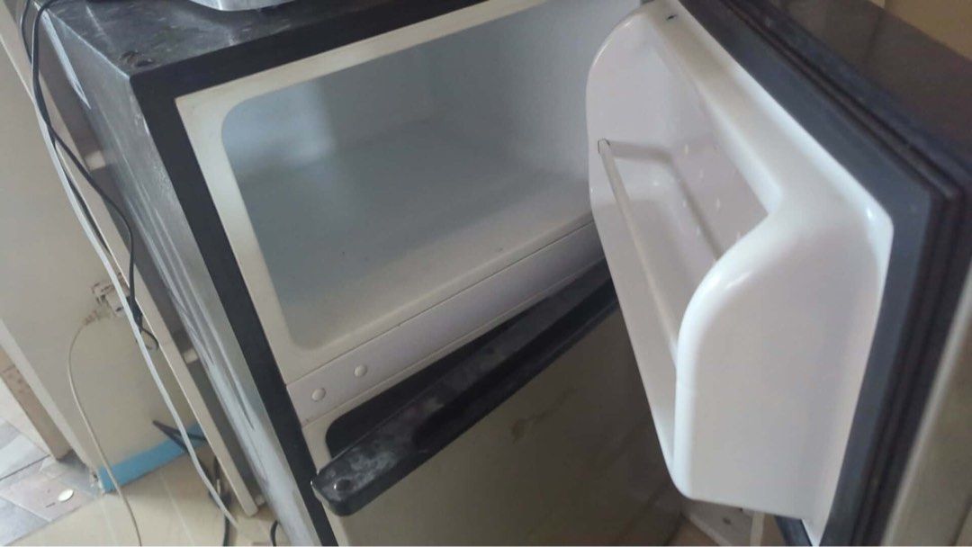 Fujidenzo Mini Fridge (Category: Refrigerators and Freezers) located in Makati City. Submitted by jkrivera_jka (Listing ID 1453860897, Image 3). Description: - Fujidenzo Mini Fridge - Works well, perfect for small spaces (dorm rooms, offices) - Includes a freezer compartment - Cleaned and ready for a new home - Bought less than 2 years ago - Brand New Price 9,500.