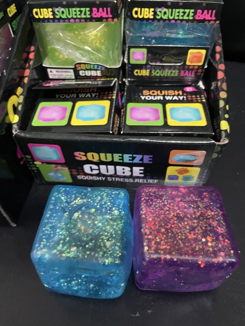 Glitter Needoh Squishy (Category: Craft Supplies & Tools) located in San Jose del Monte. Submitted by momma_buys (Listing ID 1453951194, Image 2). Description: - Squishy stress relief cubes - Filled with sparkling glitter - Available in purple, green, pink, and blue - Great for fidgeting and stress relief - Fun for kids and adults alike - Perfect for your desk or bag.