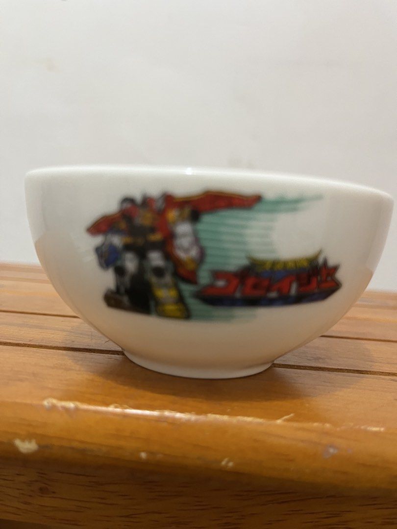 Goseiger Power Rangers Ceramic Bowl—(302) (Category: Dinnerware & Cutlery) located in Taguig. Submitted by minmin_parker (Listing ID 1453944886, Image 2). Description: - Cute Goseiger bowl featuring Power Rangers characters. - Features a cool robot design on the other side. - Made of durable ceramic material. - Microwave and dishwasher safe for convenience. - Ideal gift for kids or any Power Rangers enthusiast..
