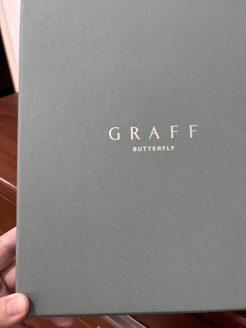 Graff (Category: Necklaces) located in Singapore. Submitted by charischng (Listing ID 1453860923, Image 3). Description: GRAFF. Brand new leather Graff butterfly handbag / mobile attachments. Graff printed on the butterflies. Complete in Graff box packaging and paper bag . .