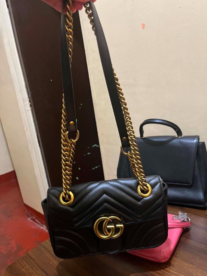 Gucci Marmont Small Shoulder Bag Black Leather (Category: Luxury Bags & Wallets) located in Manila. Submitted by mela020 (Listing ID 1453959869, Image 3). Description: - Authentic Gucci Marmont bag - Small size - Black quilted leather - Iconic gold GG hardware - Versatile chain strap - Ideal for evenings out or daily wear.
