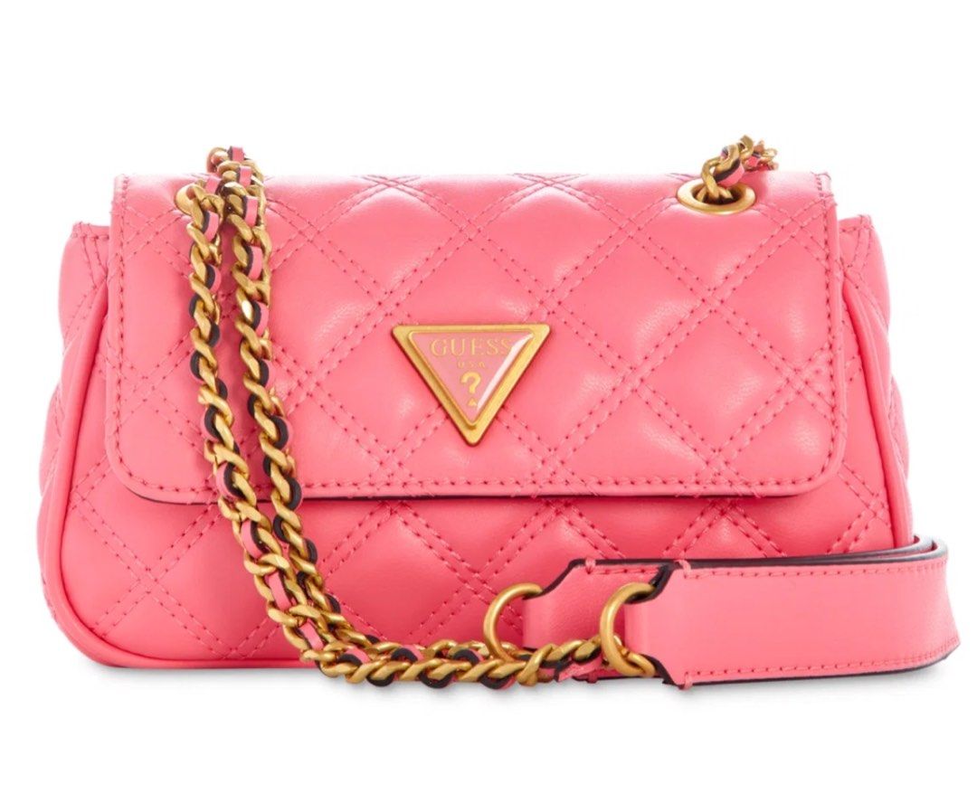 Guess Giully Mini Convertible Flap Quilted Crossbody (Category: Shoulder Bags) located in San Juan City. Submitted by riggieee (Listing ID 1453895317, Image 1). Description: - Mini sized bag; 7-3/4”W x 4-1/4”H x 1-3/4”D (width is measured across the bottom of the bag); 0.84 lbs. approx. weight -Silhouette is based off 5’9” model 12-3/5”L - 22”L convertible chain strap -Magnetic flap closure -Antique gold-tone hardware -Bought from Korea -Price sl