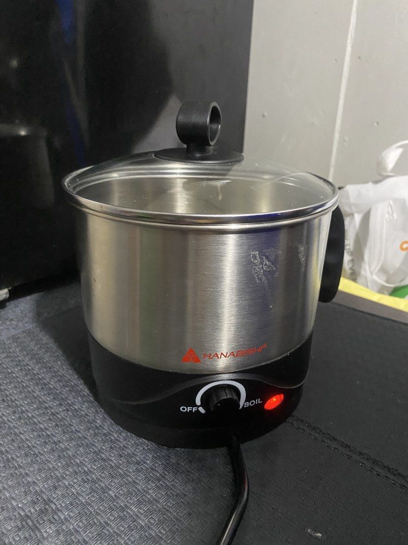 Hanabishi Electric Pot with Steamer Rack (Category: Cookware & Accessories) located in Pateros City. Submitted by nixx_pixie (Listing ID 1453940508, Image 1). Description: Loc: Manila - Hanabishi Electric Pot - Durable stainless steel body - Clear glass lid for easy monitoring - Comes with a convenient steamer rack - Versatile for cooking, boiling, and steaming - Easy-to-use simple dial control - Indicator light shows when the pot is on - Power c