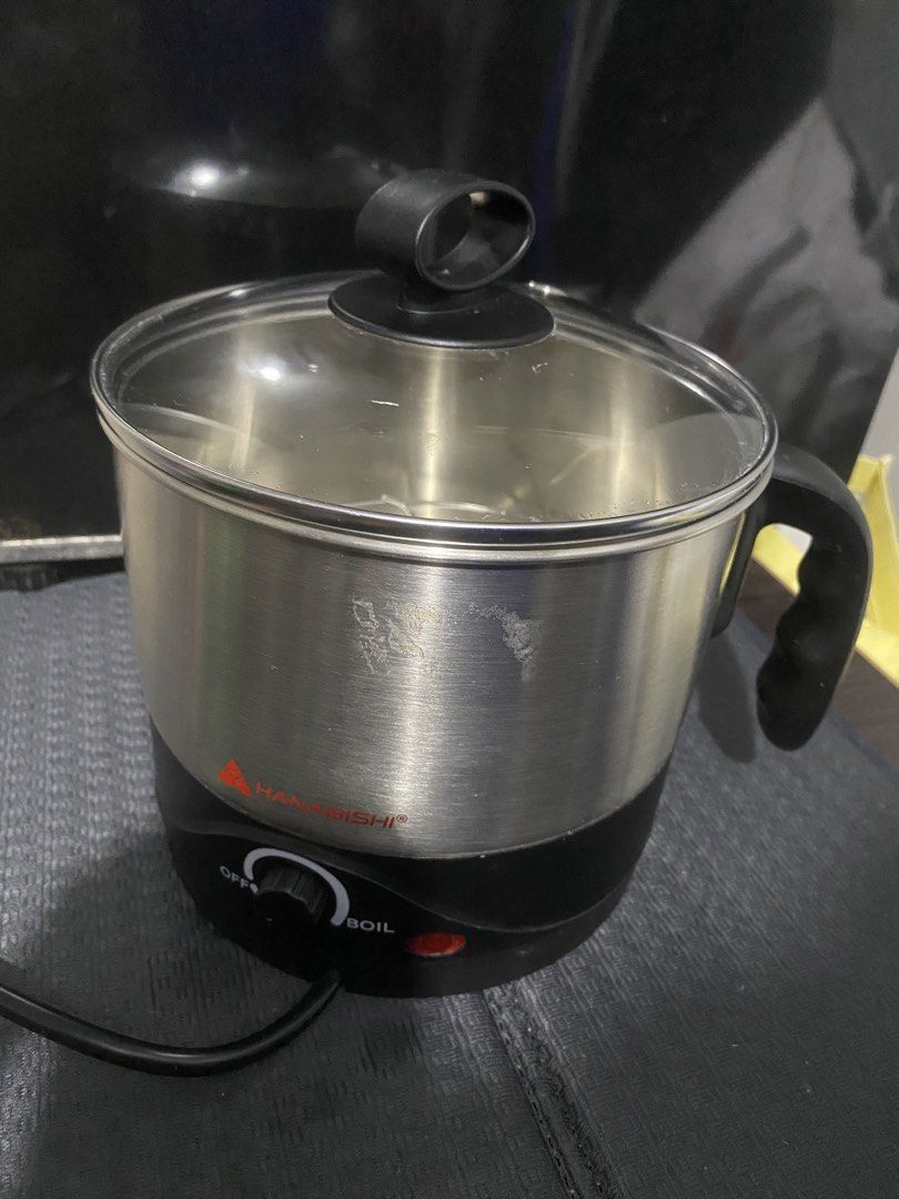 Hanabishi Electric Pot with Steamer Rack (Category: Cookware & Accessories) located in Pateros City. Submitted by nixx_pixie (Listing ID 1453940508, Image 2). Description: Loc: Manila - Hanabishi Electric Pot - Durable stainless steel body - Clear glass lid for easy monitoring - Comes with a convenient steamer rack - Versatile for cooking, boiling, and steaming - Easy-to-use simple dial control - Indicator light shows when the pot is on - Power c