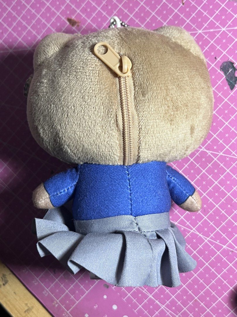 Hello Kitty Plush Keychain with Zipper Pocket (Category: Plushies & Soft Toys) located in Manila. Submitted by thedreamcart (Listing ID 1453907405, Image 2). Description: - Adorable Kitty plush keychain. - Dressed in a cute blue school uniform with a grey pleated skirt. - Includes a small zipper pocket on the back of her head. - Ideal for attaching to bags, backpacks, or as a cute accessory. - A must-have for any Kitty enthusiast!.