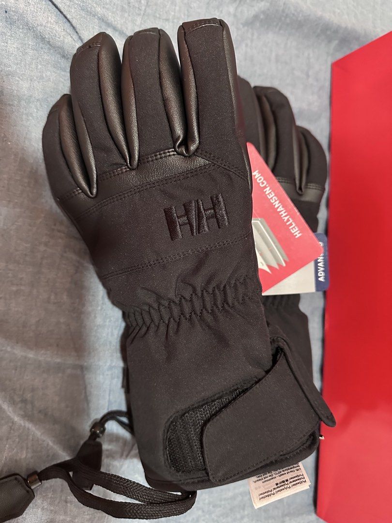 Helly Hansen Professional Ski Gloves - Black (Category: Activewear) located in Valenzuela. Submitted by jayel21 (Listing ID 1453930470, Image 3). Description: - Helly Hansen Professional Ski Gloves - Color: Black - Material: HELLY TECH PROTECTION - Features: Waterproof and breathable - Adjustable wrist strap for a secure fit - Ideal for cold weather activities - Size: Small / mens - medium womens -Unisex.