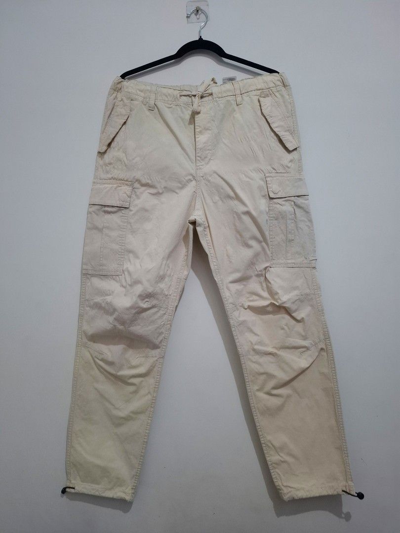 H&M - Regular Fit Ripstop cargo trousers (Category: Trousers) located in Cabuyao City. Submitted by tav.s (Listing ID 1453857105, Image 1). Description: H&M - Regular Fit Ripstop cargo trousers Brand: H&M Regular Fit Size: L (EUR L / US L) Color: Off-White / Cream Elastic waistband with drawstring Cargo pockets Adjustable drawcord hem Cotton blend with stretch Actual measurements Waist - 18.5 inches Outseam - 40.5 inches Inseam - 28 inches Leg op