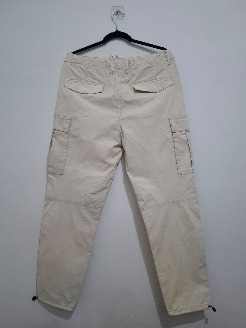 H&M - Regular Fit Ripstop cargo trousers (Category: Trousers) located in Cabuyao City. Submitted by tav.s (Listing ID 1453857105, Image 2). Description: H&M - Regular Fit Ripstop cargo trousers Brand: H&M Regular Fit Size: L (EUR L / US L) Color: Off-White / Cream Elastic waistband with drawstring Cargo pockets Adjustable drawcord hem Cotton blend with stretch Actual measurements Waist - 18.5 inches Outseam - 40.5 inches Inseam - 28 inches Leg op
