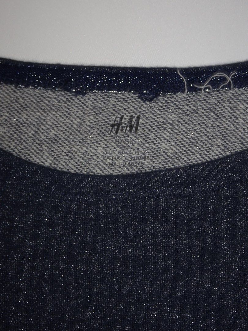 H&M Basic Dark Blue Sparkly Long Sleeve Sweatshirt (Category: Longsleeves) located in Manila. Submitted by kim.declutterss (Listing ID 1453954768, Image 3). Description: - Size: Fits small-medium - Dark blue H&M sweatshirt - Subtle sparkly thread woven throughout - Long sleeves with grey cuff detail - Crew neck - Ideal for casual wear - Color may vary due to lighting.
