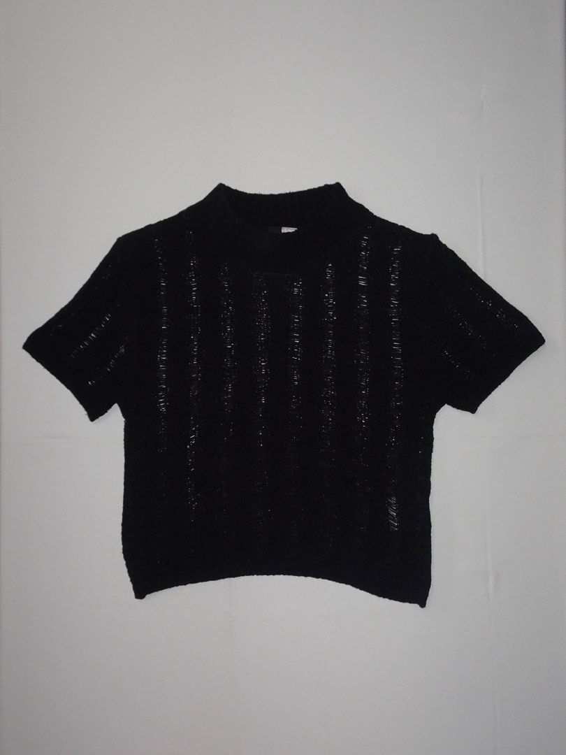 H&M Divided Black Mesh Knit Cropped Top (Category: Blouses) located in Manila. Submitted by kim.declutterss (Listing ID 1453953001, Image 1). Description: - Size: XXS (fits XXS-small) - Style: Cropped top - Color: Black - Features: Mesh knit texture, vertical stripes, mock neck - Sleeve Length: Short sleeves .