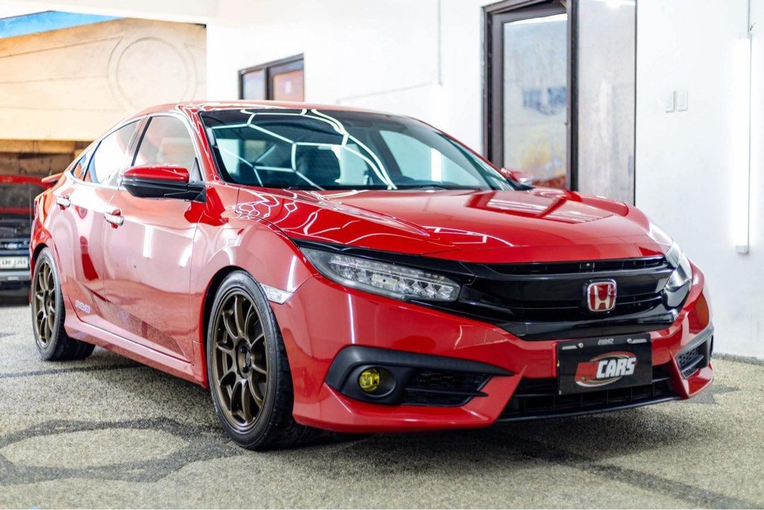 Honda Civic RS Turbo Auto (Category: Used Cars) located in Manila. Submitted by quality_cars (Listing ID 1453957637, Image 2). Description: FOR SALE‼️ 2016 Honda Civic RS TURBO • Specifications: - 60,xxx Km Mileage - 1.5 Turbo Engine - A/T w/ Paddle Shifter - Cruise control - Electronic Parking Brake - Push Start / Stop - Keyless Entry - 2pcs Smart Keys - Full Digital Gauge - 2Din Touchscreen Head Unit - Leather Seats - Bluish Clear Tint - 18s Ro