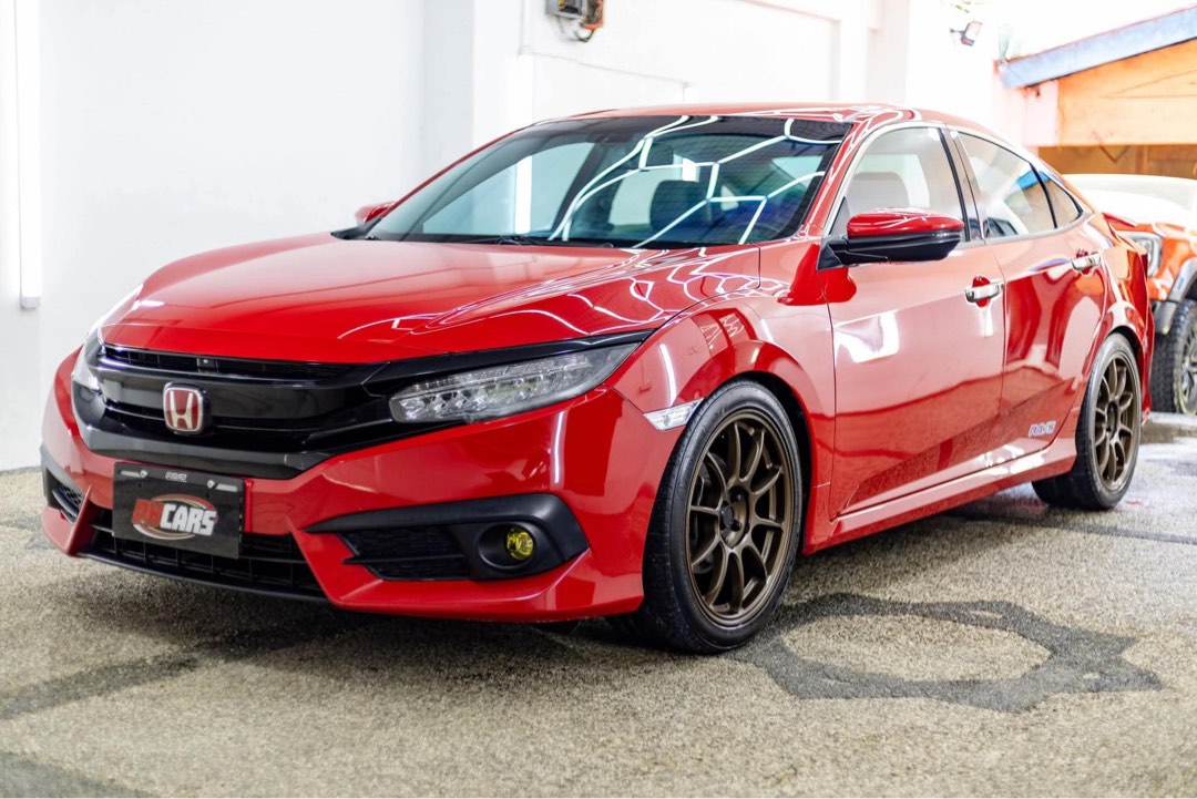 Honda Civic RS Turbo Auto (Category: Used Cars) located in Manila. Submitted by quality_cars (Listing ID 1453957637, Image 3). Description: FOR SALE‼️ 2016 Honda Civic RS TURBO • Specifications: - 60,xxx Km Mileage - 1.5 Turbo Engine - A/T w/ Paddle Shifter - Cruise control - Electronic Parking Brake - Push Start / Stop - Keyless Entry - 2pcs Smart Keys - Full Digital Gauge - 2Din Touchscreen Head Unit - Leather Seats - Bluish Clear Tint - 18s Ro