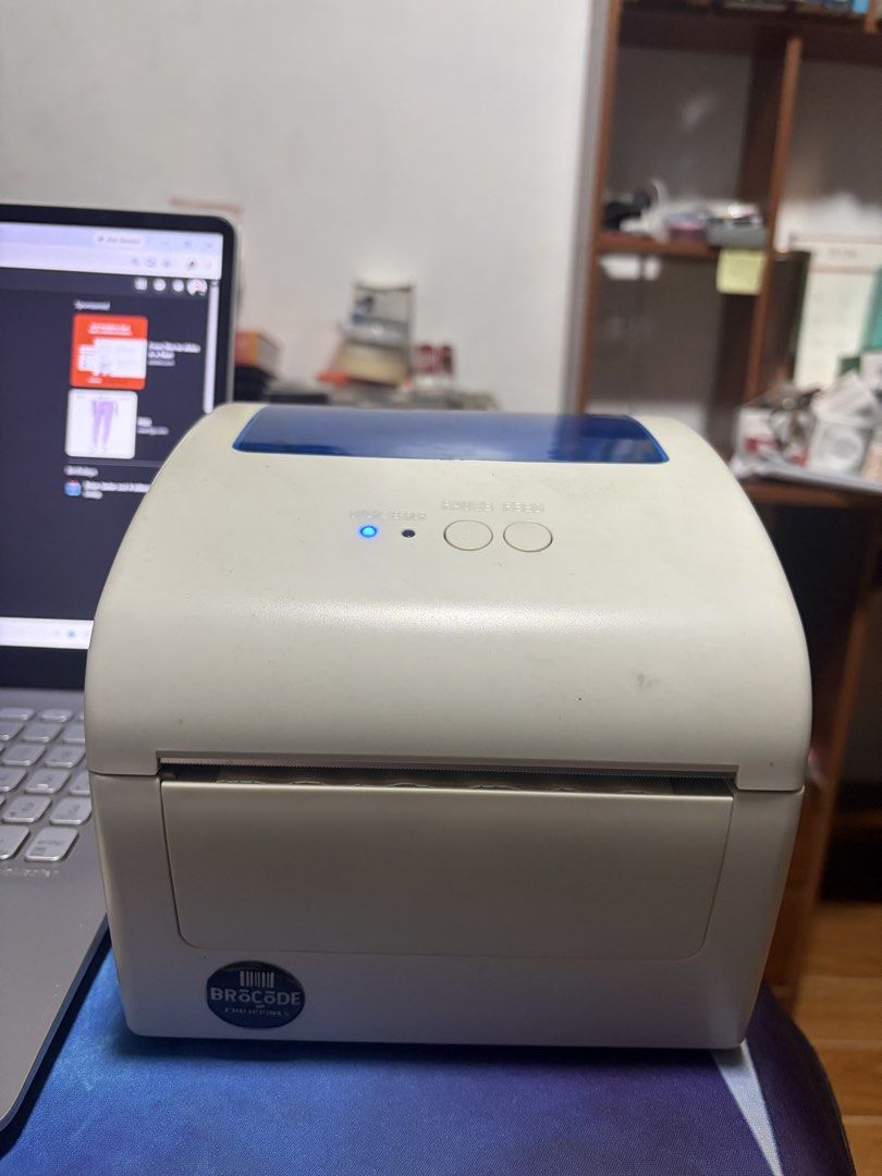 HPRT Label Printer (Category: Printers, Scanners & Copiers) located in Quezon City. Submitted by ei.cee (Listing ID 1453975727, Image 2). Description: - HPRT label printer - Works well, blue indicator light is on - Ready to print labels - Ideal for shipping or organizing - Compact size RFS : Not used. .