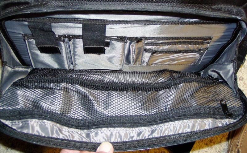 Imported DELL black laptop briefcase case bag (Category: Laptop Bags & Sleeves) located in Marikina City. Submitted by minimalistmanila (Listing ID 1453875078, Image 2). Description: Imported Dell laptop bag from Singapore. With padding inside and on bag strap. Fits M/L laptops. Sturdy thick hard quality to secure your laptop. Not the flimsy thin lightweight types. Sparingly used. In very good condition. Get this now! .