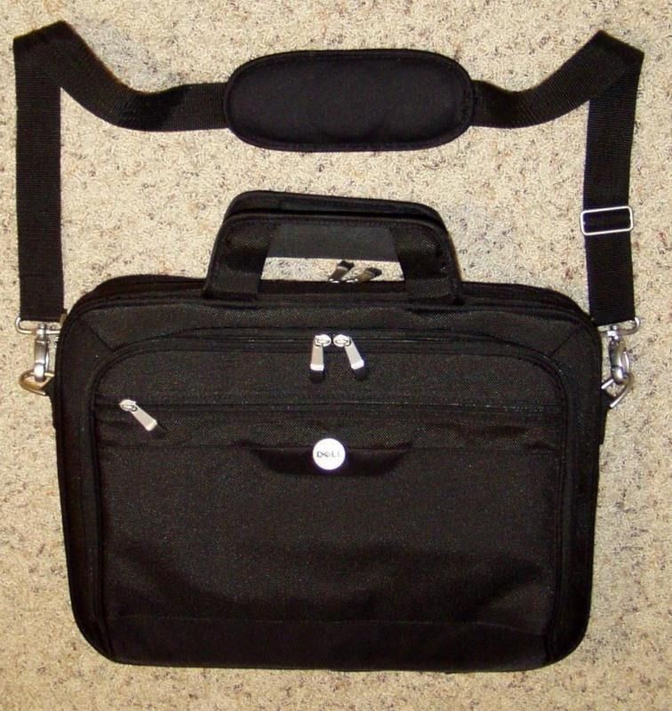 Imported DELL black laptop briefcase case bag (Category: Laptop Bags & Sleeves) located in Marikina City. Submitted by minimalistmanila (Listing ID 1453875078, Image 1). Description: Imported Dell laptop bag from Singapore. With padding inside and on bag strap. Fits M/L laptops. Sturdy thick hard quality to secure your laptop. Not the flimsy thin lightweight types. Sparingly used. In very good condition. Get this now! .