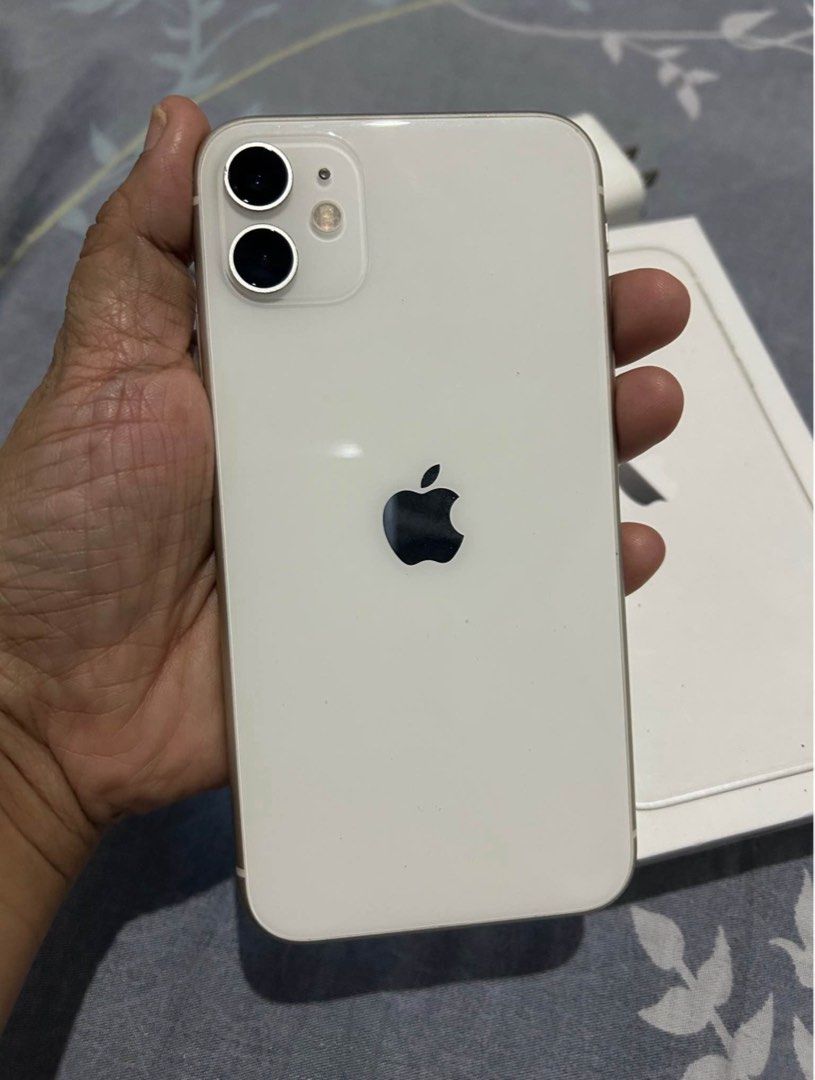 iPhone 11 128GB Pearl White (Category: iPhone 11 Series) located in Quezon City. Submitted by high.score (Listing ID 1453838727, Image 3). Description: iPhone 11 128GB Pearl White ▫️ 101% Good condition ▫️ 101% Smooth (Screen & camera protected since day one) ▫️Complete with box ▫️Factory unlock (Any sim will do) ▫️Working face ID ▫️Working True tone ▫️Latest iOS Firmware ▫️Battery health 75% (Orig apple battery / makunat pa) ▫️Replaced LCD (Almo