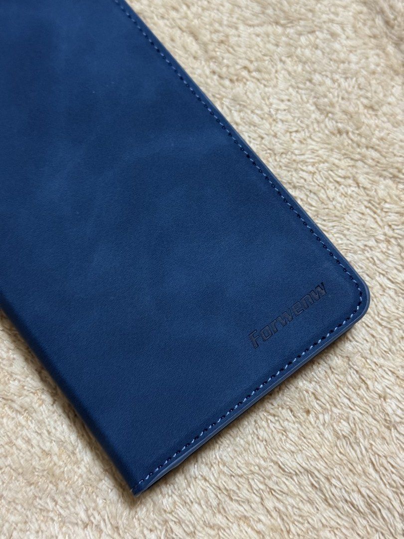 Iphone 15 (fifteen) Pro Max Blue Flip Case (Category: Cases & Sleeves) located in Manila. Submitted by averythingg (Listing ID 1453889244, Image 3). Description: Velvet blue texture. Durable and thick material. Never used. .
