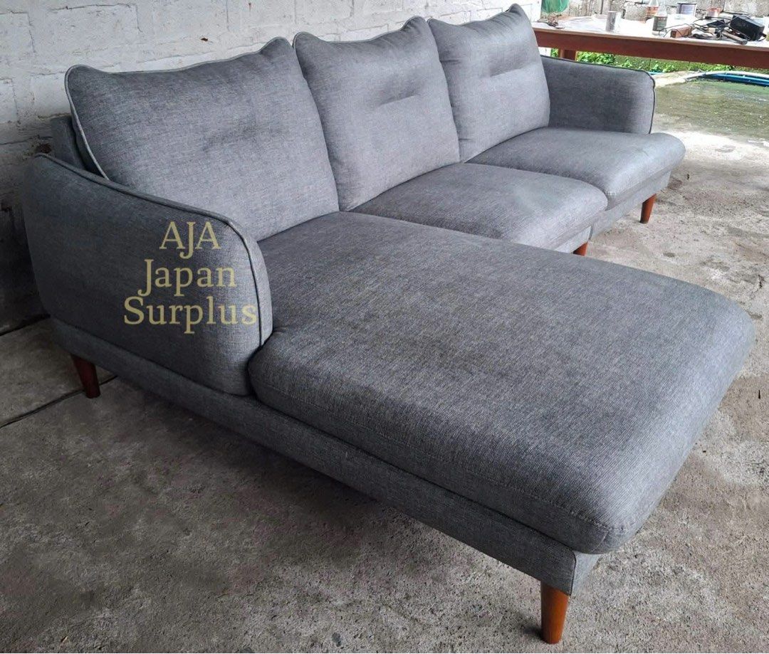 Japan Surplus L-Type Sofa (Category: Sofas) located in Quezon City. Submitted by airabernardo27 (Listing ID 1453844577, Image 3). Description: 🎌 L-Type Sofa🎌 💙 Negotiable Price 💙 ✔ Surplus from Japan ✔ Heavy-duty build ✔ Thick Rubber like fabric covers ✔ Durable solid wood frame ✔ Cleaned and sanitized with Lysol spray ‼️ Issue: Faded part because of erased penmarker writing(see last picture) Perfect for living rooms, entertainment areas, or 