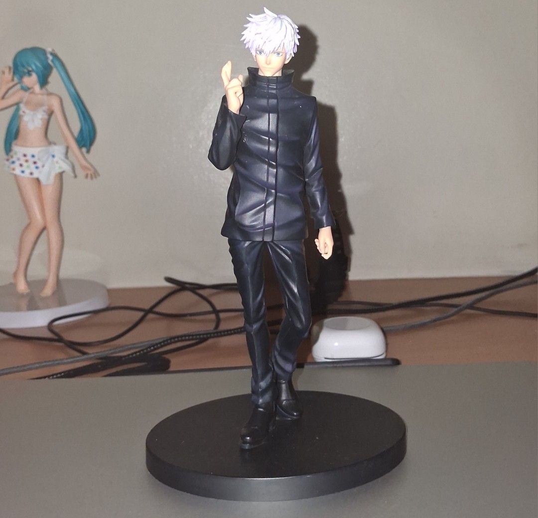 Jujutsu Kaisen Satoru Gojo Figure (Category: Figurines & Statues) located in Manila. Submitted by revri (Listing ID 1453931141, Image 1). Description: -Original - Satoru Gojo figure from Jujutsu Kaisen - Wearing his iconic black outfit - Stands on a black circular base - No original box included - A must-have for any anime fan's collection.