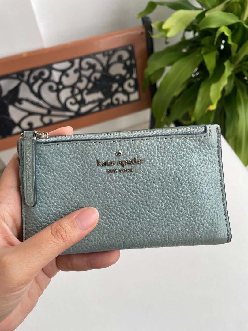 Kate Spade Bifold Wallet (Category: Purses & Pouches) located in Cainta. Submitted by 93fty (Listing ID 1453882315, Image 1). Description: Kate Spade Bifold Wallet • WYSWIG, kindly see actual photos posted 💛.