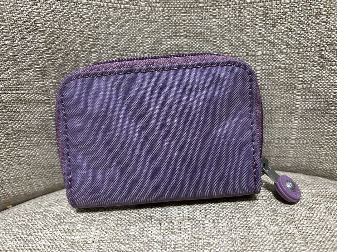 Kipling Bifold Wallet - Original (PAMIGAY PRICE) (Category: Wallets & Card holders) located in Quezon City. Submitted by ladyJR (Listing ID 1453819414, Image 2). Description: Super Bagsak presyo for an original bag - Personal bag ALL ORIGINAL!! Rfs: Decluttering, need space and funds FREE crochet hair tie/clip!! Kipling Bifold Wallet - Original Used Once - No Issue Bought from US Live Seller Size: M - cm, W - cm, H - cm Actual color: Light Purple
