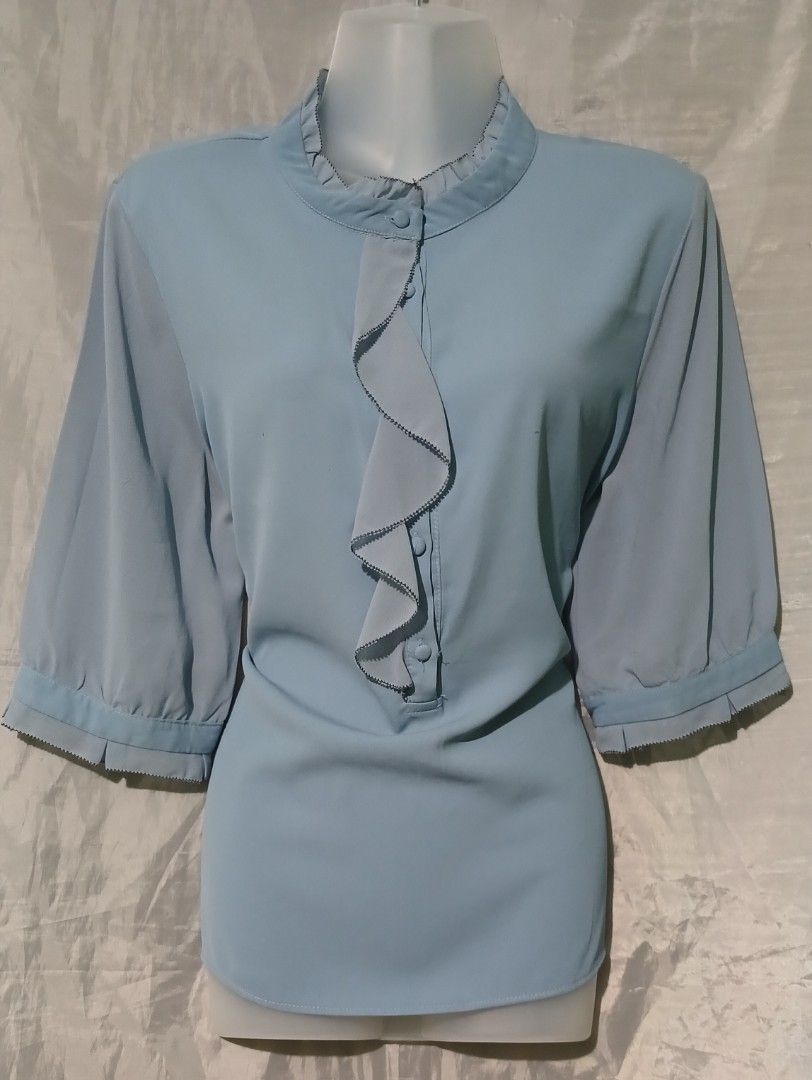 Light Blue Ruffle Blouse from Thailand 🇹🇭 (Category: Looking For) located in Taguig. Submitted by miss_rein (Listing ID 1453931520, Image 2). Description: Length: 25 inches Chest/Bust: 40 - 42 inches Sleeve length: 14 inches Preloved bought in Bangkok, Thailand RFS: Decluttering | No longer needed.
