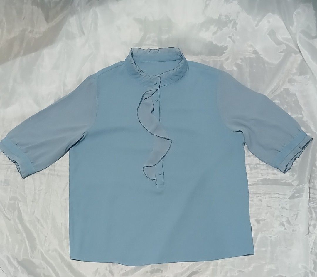 Light Blue Ruffle Blouse from Thailand 🇹🇭 (Category: Looking For) located in Taguig. Submitted by miss_rein (Listing ID 1453931520, Image 3). Description: Length: 25 inches Chest/Bust: 40 - 42 inches Sleeve length: 14 inches Preloved bought in Bangkok, Thailand RFS: Decluttering | No longer needed.