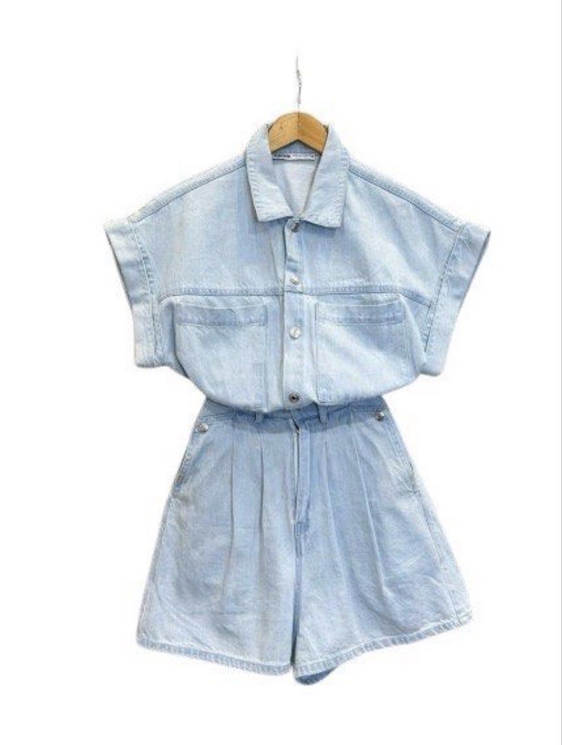 Light Wash Denim Short Sleeve Romper (Category: Rompers) located in Manila. Submitted by decluterthings888 (Listing ID 1453997994, Image 3). Description: - Cute light wash denim romper. NO BRAND - Short sleeves with rolled cuffs - Elasticated waist for comfort - Button-up front - Functional pockets - Ideal for casual outings - Versatile styling with sneakers or sandals.