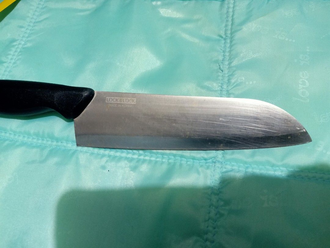 Lock & Lock Kitchen Knife Made in Korea (Category: Knives & Chopping Boards) located in Pasig City. Submitted by urdal01 (Listing ID 1453946449, Image 2). Description: - Lock & Lock Kitchen Knife - Made in Korea - Approx. 15cm blade length - Black handle - Ideal for chopping and slicing - A reliable kitchen essential.
