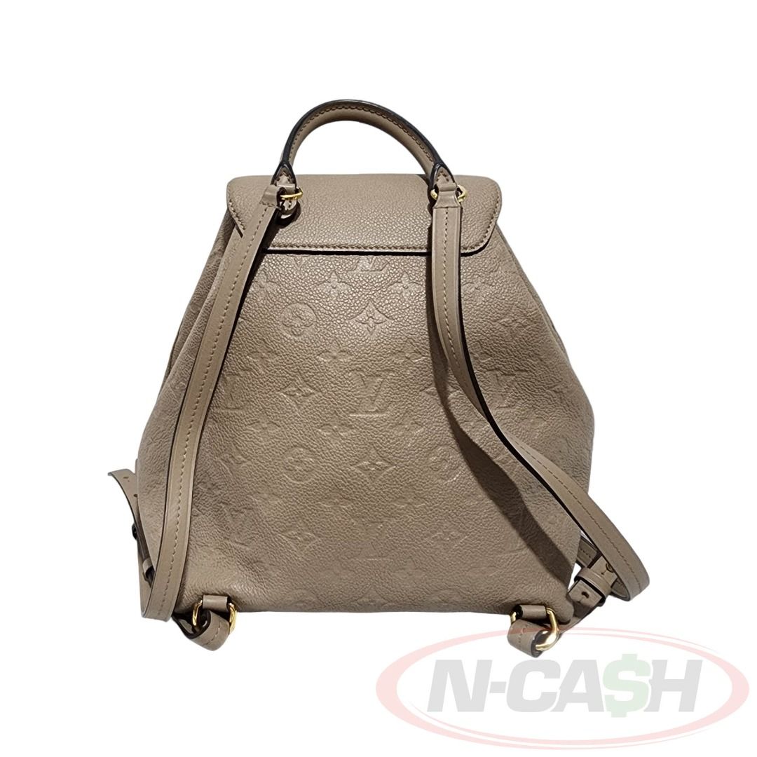 Louis Vuitton Montsouris PM Backpack (Category: Luxury Bags & Wallets) located in Quezon City. Submitted by luxury_by_n-cash (Listing ID 1453871713, Image 3). Description: Louis Vuitton Montsouris PM Backpack PRE-OWNED Brand: LOUIS VUITTON Measures: Approximate dimensions: 23 × 28 × 15 cm Material: Monogram Empreinte embossed leather Color: Tourterelle / Turtledove Hardware: Gold-tone Made in France Date Code: CA2260 Retail Price of $2850 ITEM IN