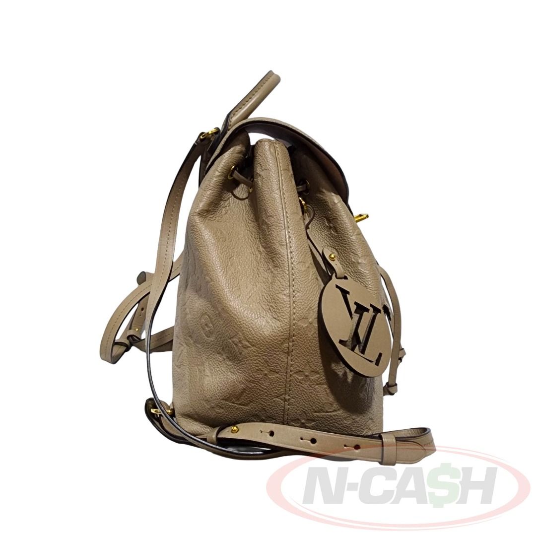 Louis Vuitton Montsouris PM Backpack (Category: Luxury Bags & Wallets) located in Quezon City. Submitted by luxury_by_n-cash (Listing ID 1453871713, Image 2). Description: Louis Vuitton Montsouris PM Backpack PRE-OWNED Brand: LOUIS VUITTON Measures: Approximate dimensions: 23 × 28 × 15 cm Material: Monogram Empreinte embossed leather Color: Tourterelle / Turtledove Hardware: Gold-tone Made in France Date Code: CA2260 Retail Price of $2850 ITEM IN