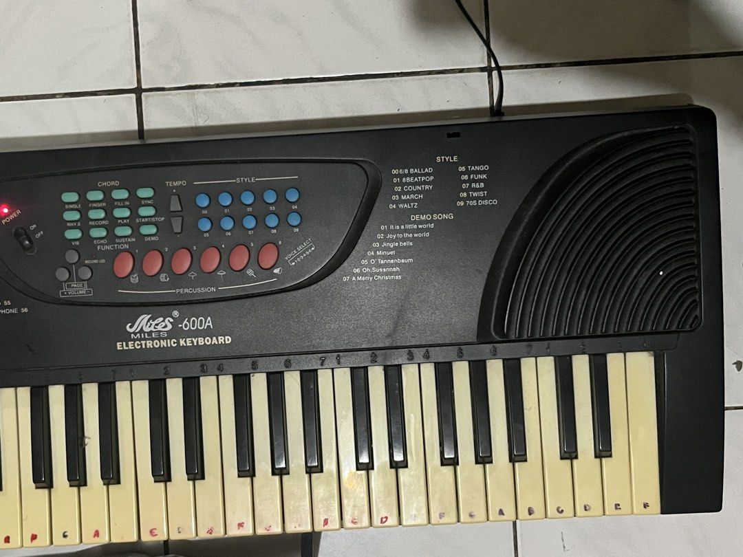 Miles MLS-600A Electronic Keyboard (Category: Musical Instruments) located in Caloocan City. Submitted by trashys0da (Listing ID 1453920794, Image 3). Description: Miles MLS-600A Electronic Keyboard w/ box Features: • 61-key electronic keyboard • Multiple tones, rhythms, and demo songs • Built-in stereo speakers • Volume and tempo controls • Lightweight and portable • Easy-to-use controls for beginners.