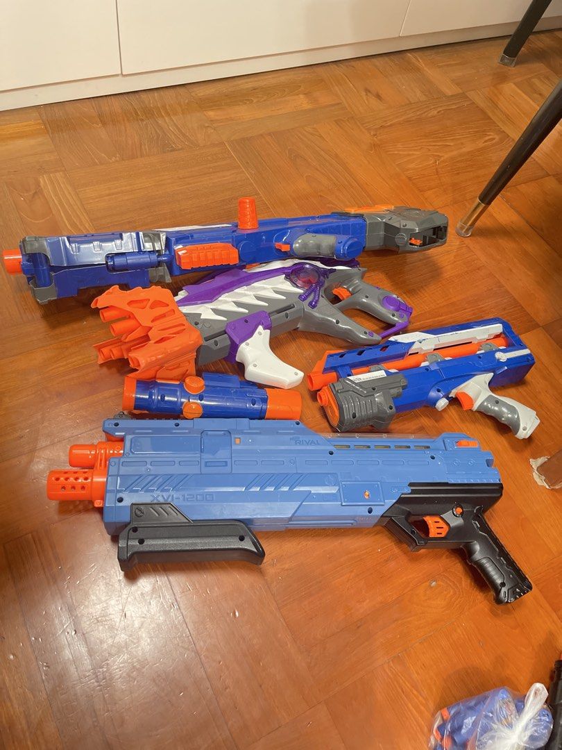 Nerf Rival Blasters Bundle （分類：動作及對戰玩具）位於 Hong Kong。 由 johnzhk 提交（商品編號 1453978174，圖片 1）。簡介： Selling a bundle of Nerf Rival blasters. Includes the blue XV-1200 model and another blue and orange blaster. Also a purple and white blaster. Great for collection or play. Some wear and tear from use.。