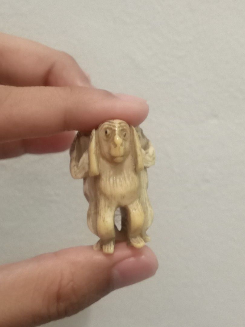 Netsuke Three Wise Monkeys Carving - See No Evil, Hear No Evil, Speak No Evil (Category: Figurines & Statues) located in General Trias. Submitted by dwyane09 (Listing ID 1453821936, Image 2). Description: - Adorable carving of the Three Wise Monkeys: See No Evil, Hear No Evil, Speak No Evil. - Crafted from a light-colored material, possibly bone or ivory. - Compact size, ideal for display on a desk or shelf. - A unique find for collectors..