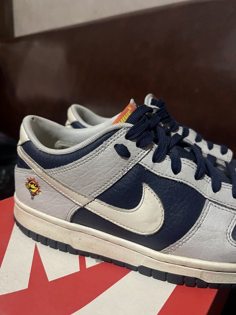 Nike Dunk Low BG (Category: Babies & Kids Fashion) located in Quezon City. Submitted by assdeclutters (Listing ID 1453897659, Image 3). Description: - Colorway: Photon Dust/White - Unique graphic detail on the side (Nike logo turns yellow when sunlight strikes) - Comes with original box Size 6Y, can be worn by adults US 7 women (24 cm). Rfs: decluttering, size is a bit smaller than what I expected. Price is negotiable!!.